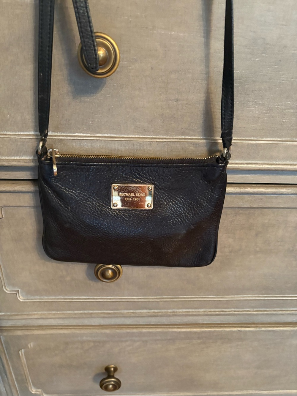 Michael Kors Black Pebbled Leather Crossbody with Gold Plaque